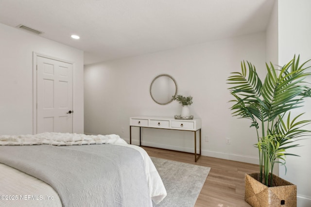 1465 Lambert Ave, Flagler Beach, FL 32136 - bedroom with light wood-type flooring and recessed lighting