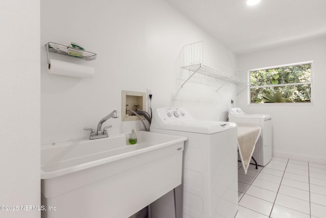 1465 Lambert Ave, Flagler Beach, FL 32136 - laundry room featuring washing machine and clothes dryer and light tile patterned floors