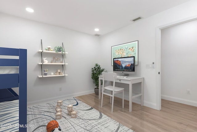 1465 Lambert Ave, Flagler Beach, FL 32136 - bedroom featuring wood finished floors and recessed lighting