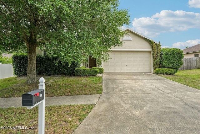 3005 Sunset Ridge Dr, Middleburg, FL 32068 - view of property hidden behind natural elements featuring driveway, a garage, and stucco siding