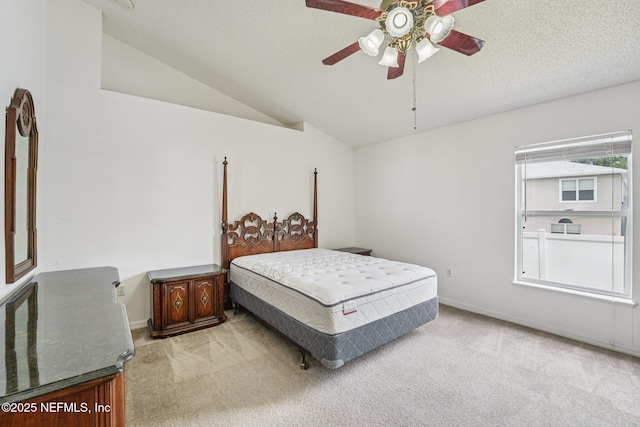 3005 Sunset Ridge Dr, Middleburg, FL 32068 - bedroom with light carpet, lofted ceiling, ceiling fan, and a textured ceiling