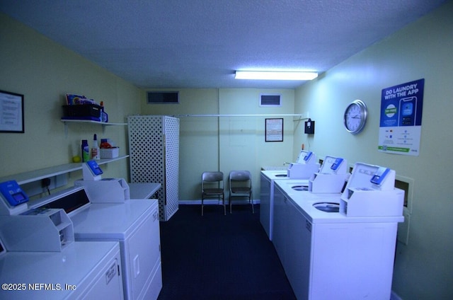 1810 Sevilla Blvd Unit 202, Atlantic Beach, FL 32233 - community laundry room featuring washing machine and clothes dryer and a textured ceiling