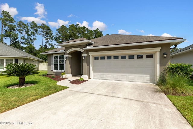 94032 Woodbrier Cir, Fernandina Beach, FL 32034 - view of front facade with stucco siding, concrete driveway, an attached garage, and a shingled roof