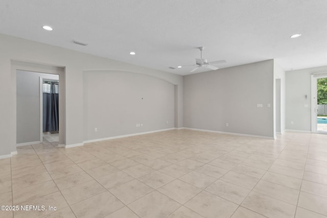 94032 Woodbrier Cir, Fernandina Beach, FL 32034 - unfurnished room with recessed lighting, ceiling fan, and light tile patterned flooring