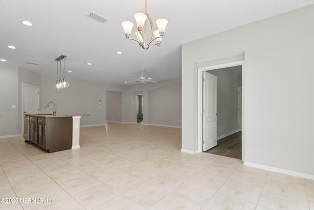 94032 Woodbrier Cir, Fernandina Beach, FL 32034 - unfurnished living room with recessed lighting, a chandelier, ceiling fan, and light tile patterned floors