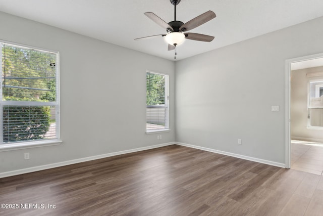 94032 Woodbrier Cir, Fernandina Beach, FL 32034 - unfurnished room with wood finished floors and ceiling fan