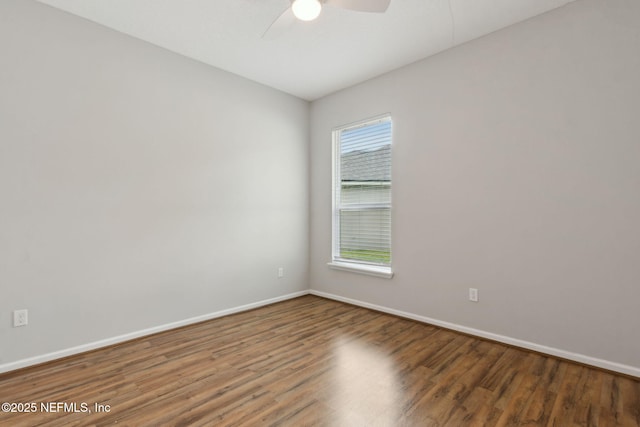 94032 Woodbrier Cir, Fernandina Beach, FL 32034 - unfurnished room with ceiling fan and wood finished floors