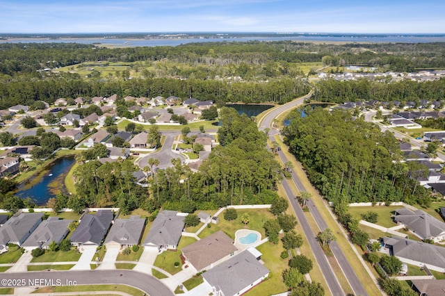 94032 Woodbrier Cir, Fernandina Beach, FL 32034 - aerial overview of property's location featuring a large body of water and nearby suburban area