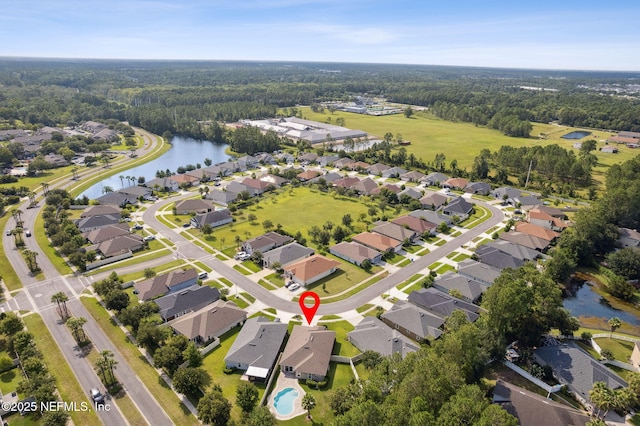 94032 Woodbrier Cir, Fernandina Beach, FL 32034 - aerial view of property's location featuring a nearby body of water and nearby suburban area