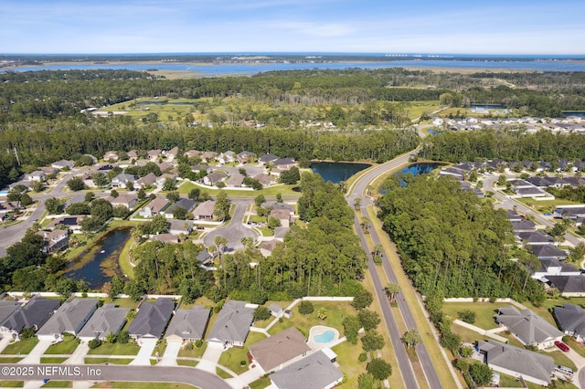 94032 Woodbrier Cir, Fernandina Beach, FL 32034 - aerial overview of property's location featuring nearby suburban area and a large body of water