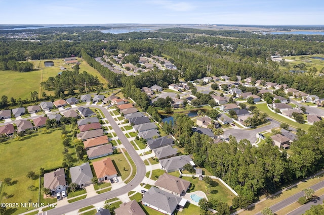 94032 Woodbrier Cir, Fernandina Beach, FL 32034 - aerial view of property and surrounding area with nearby suburban area and a nearby body of water