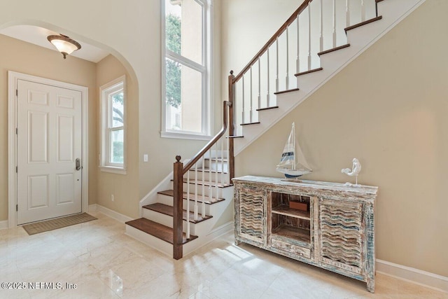 2348 Seminole Reach Ct, Atlantic Beach, FL 32233 - entryway featuring arched walkways and stairs