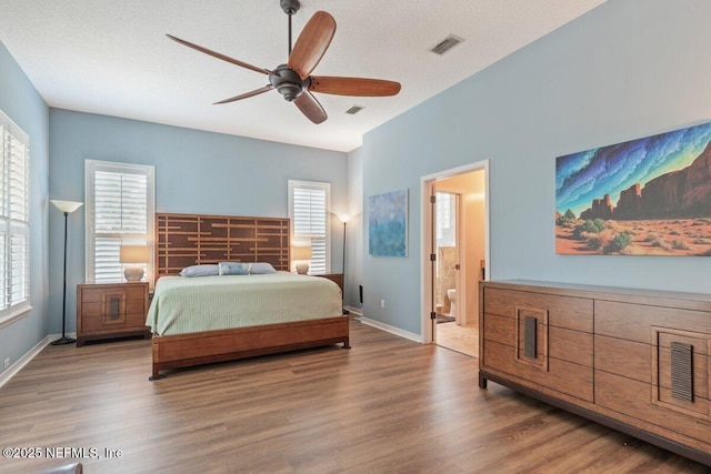 2348 Seminole Reach Ct, Atlantic Beach, FL 32233 - bedroom with wood finished floors and multiple windows