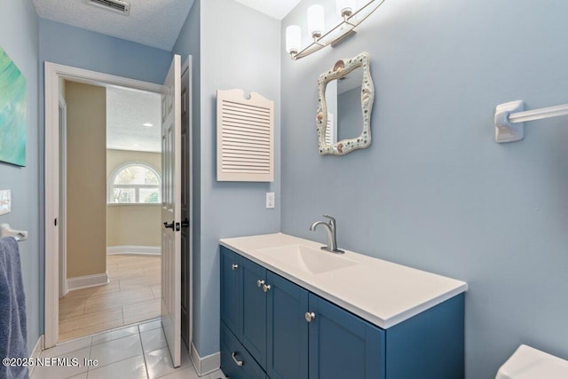 2348 Seminole Reach Ct, Atlantic Beach, FL 32233 - bathroom with vanity and a textured ceiling