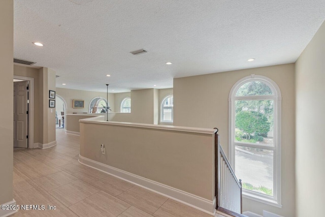 2348 Seminole Reach Ct, Atlantic Beach, FL 32233 - spare room with a textured ceiling and recessed lighting