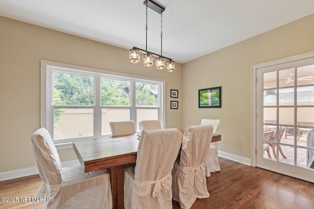 2348 Seminole Reach Ct, Atlantic Beach, FL 32233 - dining space with wood finished floors and a textured ceiling