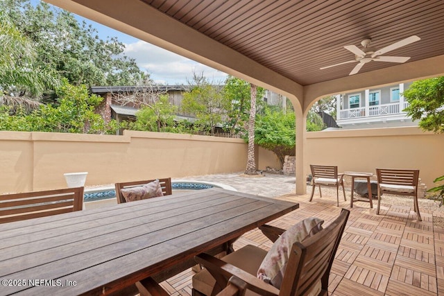 2348 Seminole Reach Ct, Atlantic Beach, FL 32233 - view of patio / terrace with outdoor dining space, ceiling fan, and a swimming pool