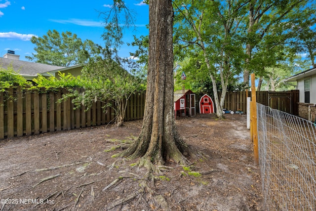 5263 Ellen Ct, Saint Augustine, FL 32086 - fenced backyard featuring a shed