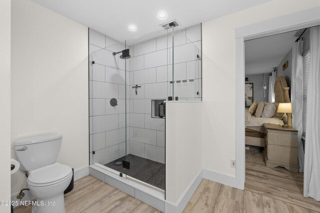 5263 Ellen Ct, Saint Augustine, FL 32086 - ensuite bathroom with a stall shower, wood finished floors, and recessed lighting
