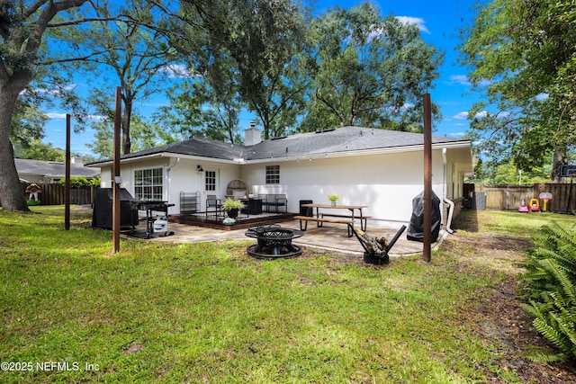 5263 Ellen Ct, Saint Augustine, FL 32086 - rear view of property featuring a patio area, a fenced backyard, and a chimney
