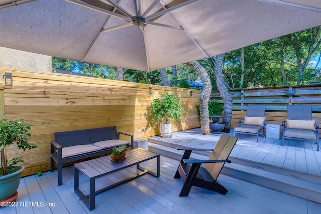 315 20th St, Atlantic Beach, FL 32233 - wooden terrace with an outdoor hangout area