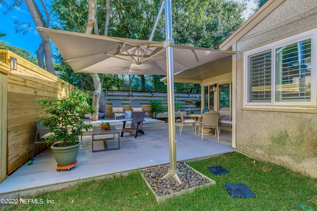 315 20th St, Atlantic Beach, FL 32233 - fenced backyard featuring a patio area