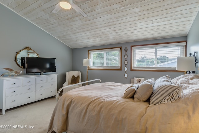 315 20th St, Atlantic Beach, FL 32233 - bedroom with light carpet, vaulted ceiling, and wooden ceiling