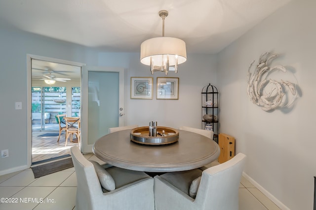 315 20th St, Atlantic Beach, FL 32233 - dining room featuring light tile patterned floors, radiator, and ceiling fan