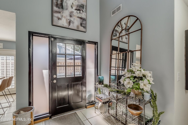 315 20th St, Atlantic Beach, FL 32233 - foyer with tile patterned floors and a towering ceiling