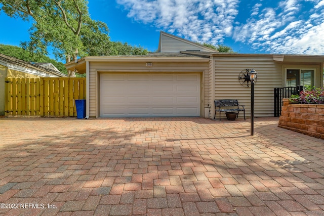 315 20th St, Atlantic Beach, FL 32233 - garage with decorative driveway