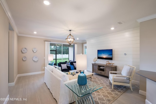 364 Higgins Loop, Saint Augustine, FL 32092 - living room featuring light wood-style floors, recessed lighting, a chandelier, and crown molding