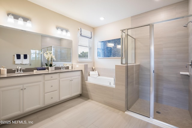 364 Higgins Loop, Saint Augustine, FL 32092 - bathroom with double vanity, a stall shower, and a garden tub