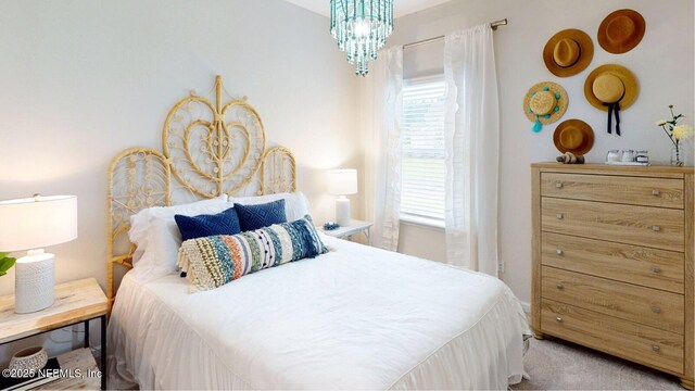 364 Higgins Loop, Saint Augustine, FL 32092 - bedroom featuring a chandelier and carpet floors