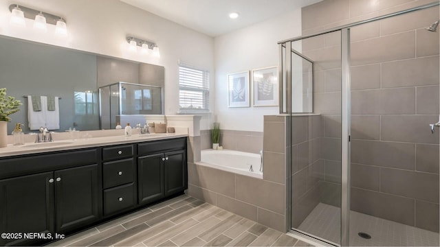 364 Higgins Loop, Saint Augustine, FL 32092 - bathroom with a stall shower, a bath, double vanity, and wood finished floors