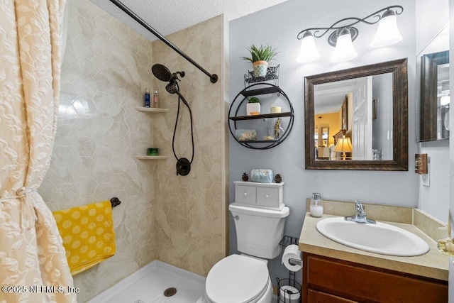 2548 Haywood Estates Ln, Jacksonville, FL 32233 - full bath featuring tiled shower, vanity, and a textured ceiling