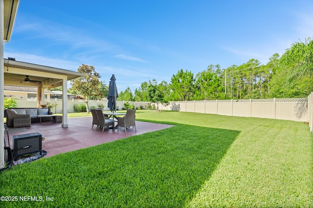 1563 Tawny Marsh Ct, Saint Augustine, FL 32092 - fenced backyard with a patio, a ceiling fan, and outdoor lounge area