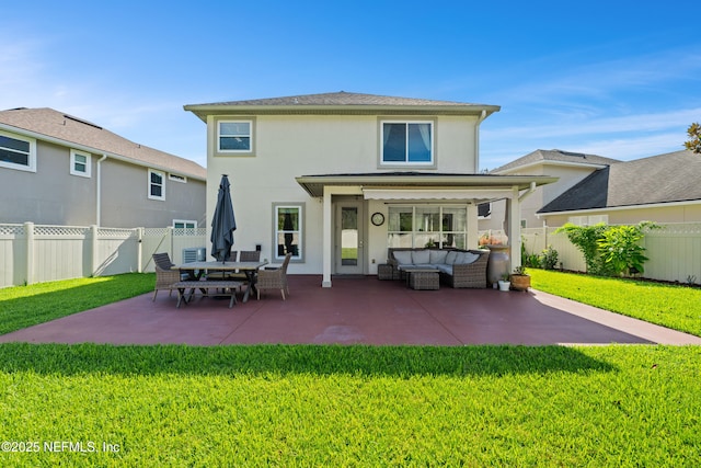 1563 Tawny Marsh Ct, Saint Augustine, FL 32092 - rear view of house featuring an outdoor hangout area, stucco siding, a patio, and a fenced backyard