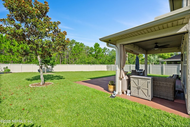 1563 Tawny Marsh Ct, Saint Augustine, FL 32092 - fenced backyard with a patio area and a ceiling fan