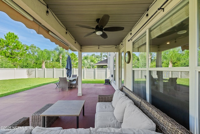 1563 Tawny Marsh Ct, Saint Augustine, FL 32092 - fenced backyard featuring outdoor dining space, a patio, a ceiling fan, and an outdoor hangout area