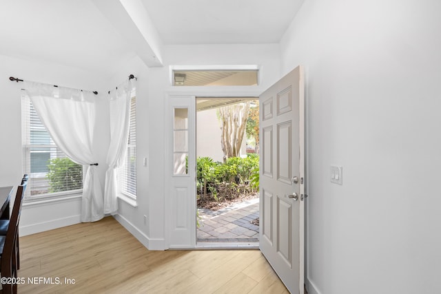 1563 Tawny Marsh Ct, Saint Augustine, FL 32092 - entrance foyer with light wood finished floors and baseboards