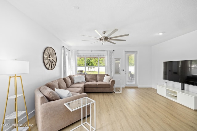 1563 Tawny Marsh Ct, Saint Augustine, FL 32092 - living room with light wood finished floors and a ceiling fan