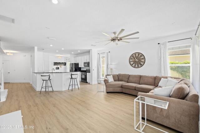 1563 Tawny Marsh Ct, Saint Augustine, FL 32092 - living area featuring ceiling fan, light wood-type flooring, and recessed lighting
