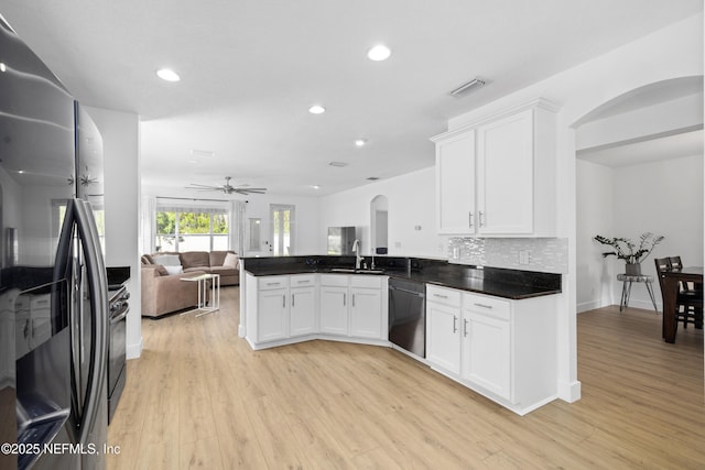 1563 Tawny Marsh Ct, Saint Augustine, FL 32092 - kitchen featuring appliances with stainless steel finishes, arched walkways, recessed lighting, open floor plan, and a ceiling fan
