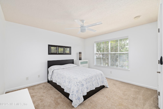 1563 Tawny Marsh Ct, Saint Augustine, FL 32092 - bedroom featuring carpet, ceiling fan, and a textured ceiling