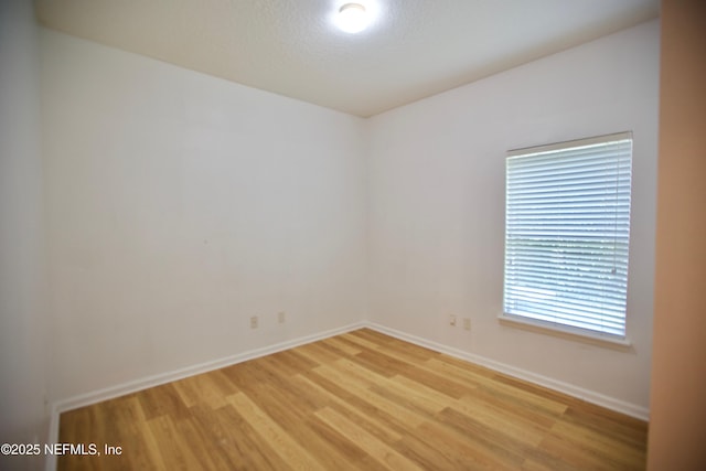 3600 Lenin Peak Ct Unit 8, Jacksonville, FL 32210 - spare room featuring light wood finished floors and baseboards