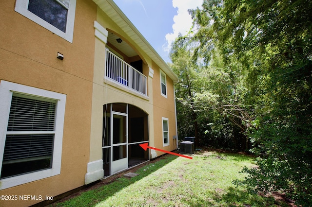 3600 Lenin Peak Ct Unit 8, Jacksonville, FL 32210 - view of grassy yard featuring a balcony