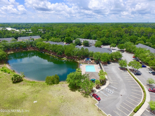 3600 Lenin Peak Ct Unit 8, Jacksonville, FL 32210 - drone / aerial view of a heavily wooded area and a nearby body of water