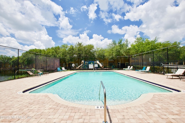 3600 Lenin Peak Ct Unit 8, Jacksonville, FL 32210 - community pool featuring a patio