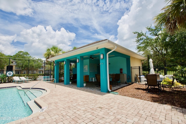 3600 Lenin Peak Ct Unit 8, Jacksonville, FL 32210 - community pool with ceiling fan and a patio
