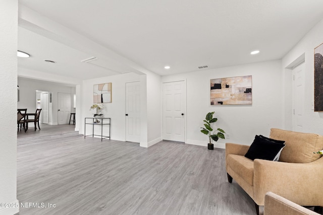 6285 Spring Forest Cir, Jacksonville, FL 32216 - sitting room featuring wood finished floors and recessed lighting